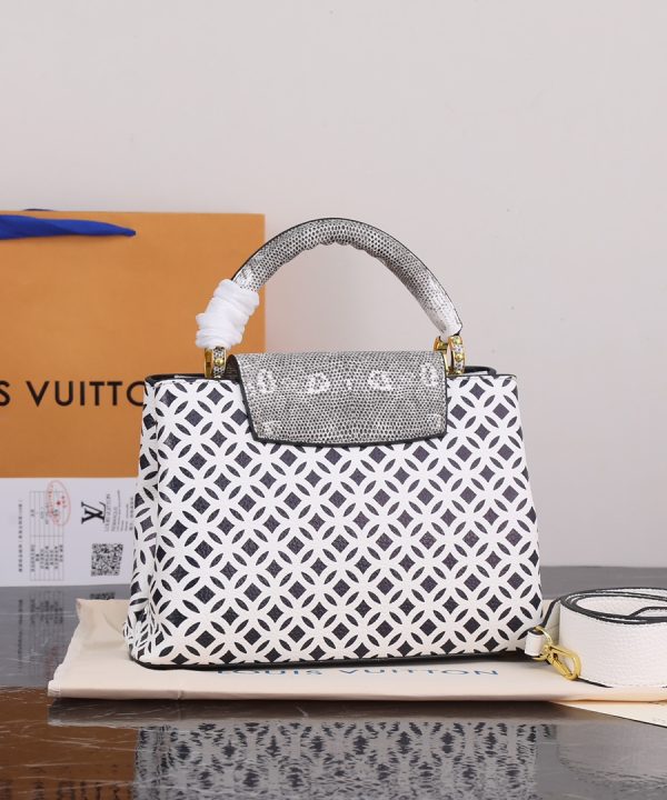 36c1b327600f422e92411a76440e18ce-1