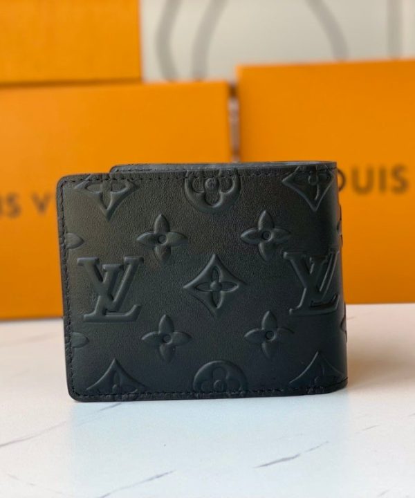 74c0a6b9687d41aca489b477174bfbd4-1