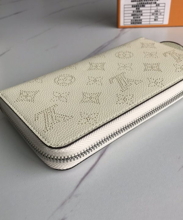 89d9c98ac56249a5ae1ef808a9f3f242-1